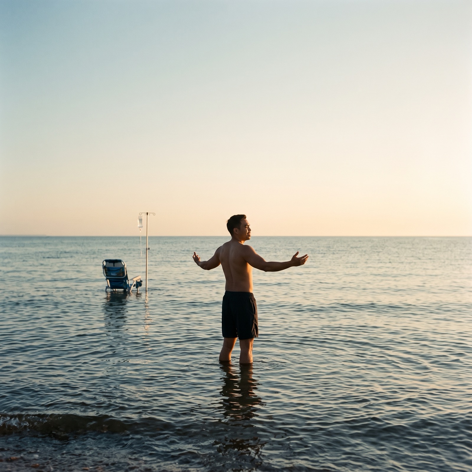 Standing waist-deep in still water